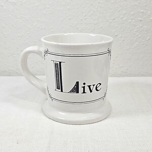 Home Essentials Live white with black border and text coffee mug